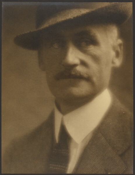 Louis Fleckenstein, [Portrait of a Man with Straw Hat]