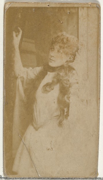 W. Duke, Sons & Co., [Actress standing in doorway], from the Actors and Actresses series (N145-8) issued by Duke Sons & Co. to promote Duke Cigarettes