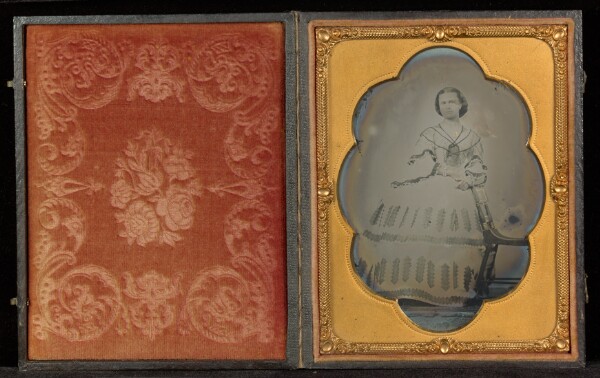 Unknown, [Full-Length Portrait of a Woman in a White Dress Next to a Chair]