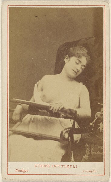 Unknown, [Unidentified woman with one breast exposed, eyes closed]