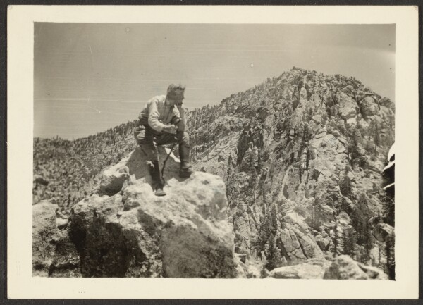 Louis Fleckenstein, [Man Atop Rocks]