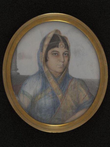 Unknown, A lady in a blue, gold-edged sari.