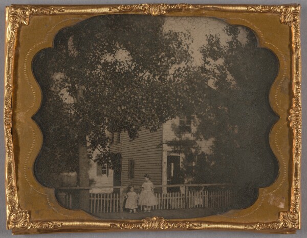 Unknown, [Portrait of Two Girls in Front of House]