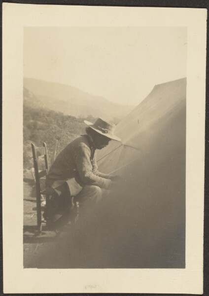 Louis Fleckenstein, [Man by Tent]