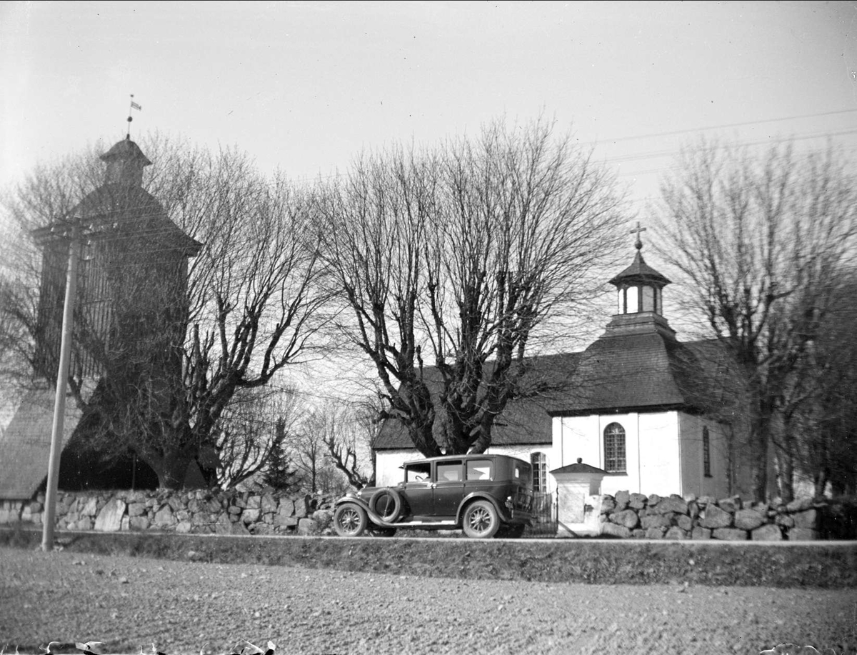 August Fredrik Schagerström, Car on the road in front of Teda church with a belfry, Teda parish, Uppland in May 1930