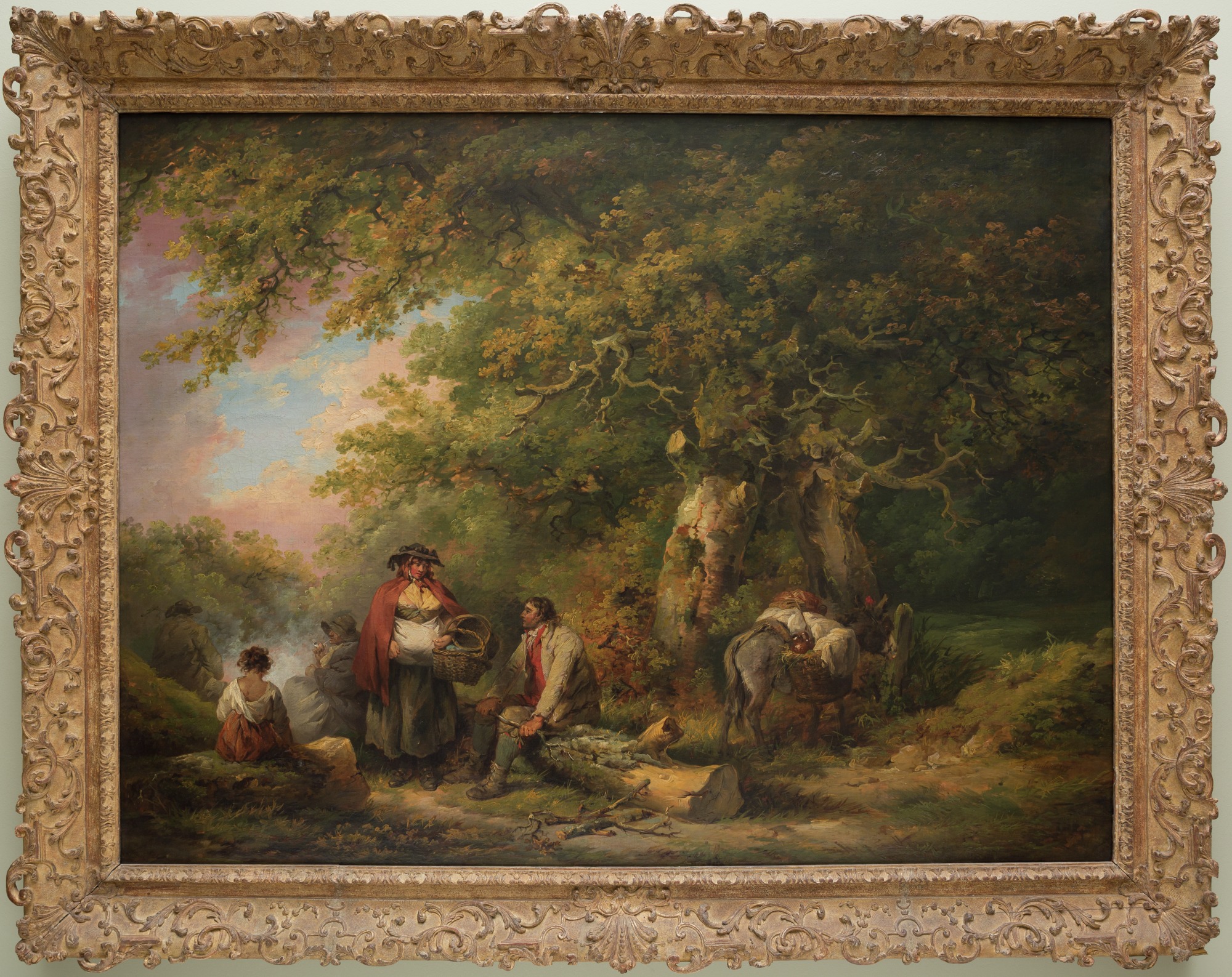 George Morland, Gypsy Encampment with Seated Man Breaking Firewood