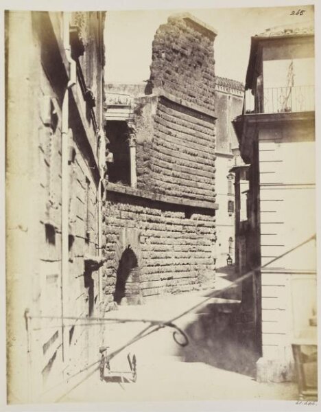 Parker, John Henry, Forums - Wall of tufa, of the time of the Kings, in the Forum of Augustus, interior, with Gate of Travertine inserted originally on the level of the Foss-way, now half buried by the raising of the road.