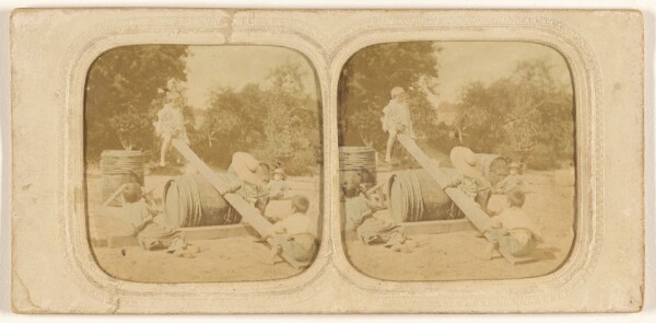Unknown, [Children on makeshift see-saw]