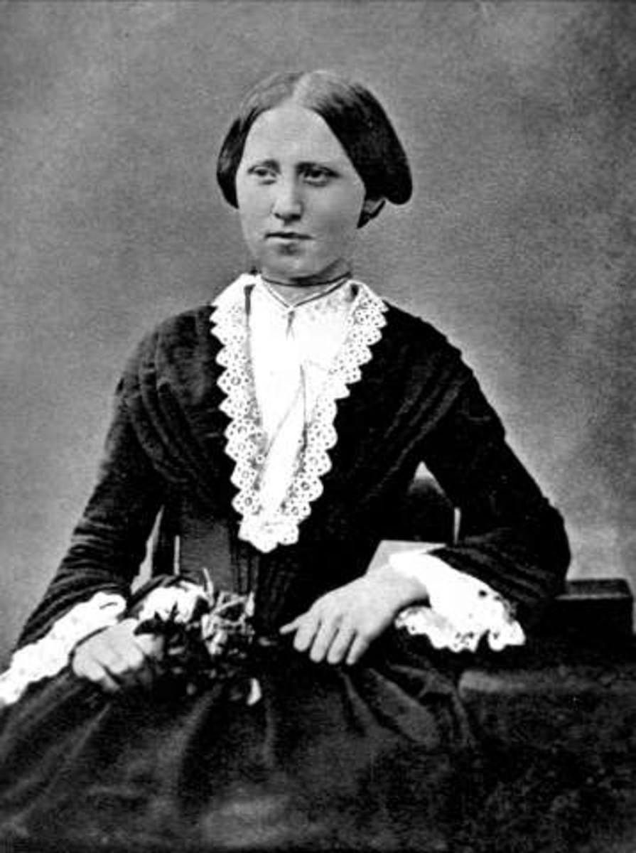 Gustav Borgen, Portrett, kvinne i mørk drakt. Frøken Josefine Gulbrandsen.
