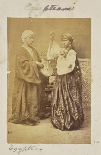 Unknown, [Group portrait of a musician and a dancer]