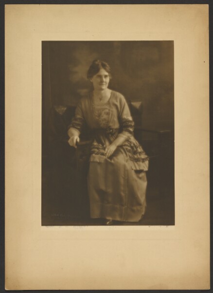 Louis Fleckenstein, [Portrait of a Seated Woman in Dress with Ribbon Accents]