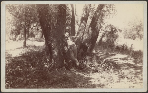 Unknown, [F.A. Williams resting against a tree]