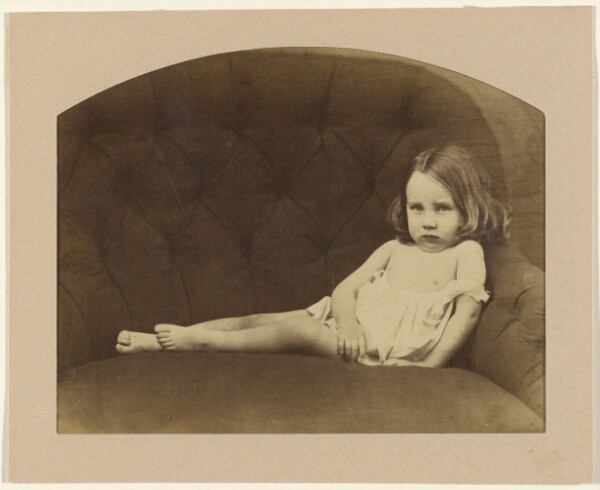 Unknown, [Portrait of a young child on armchair]