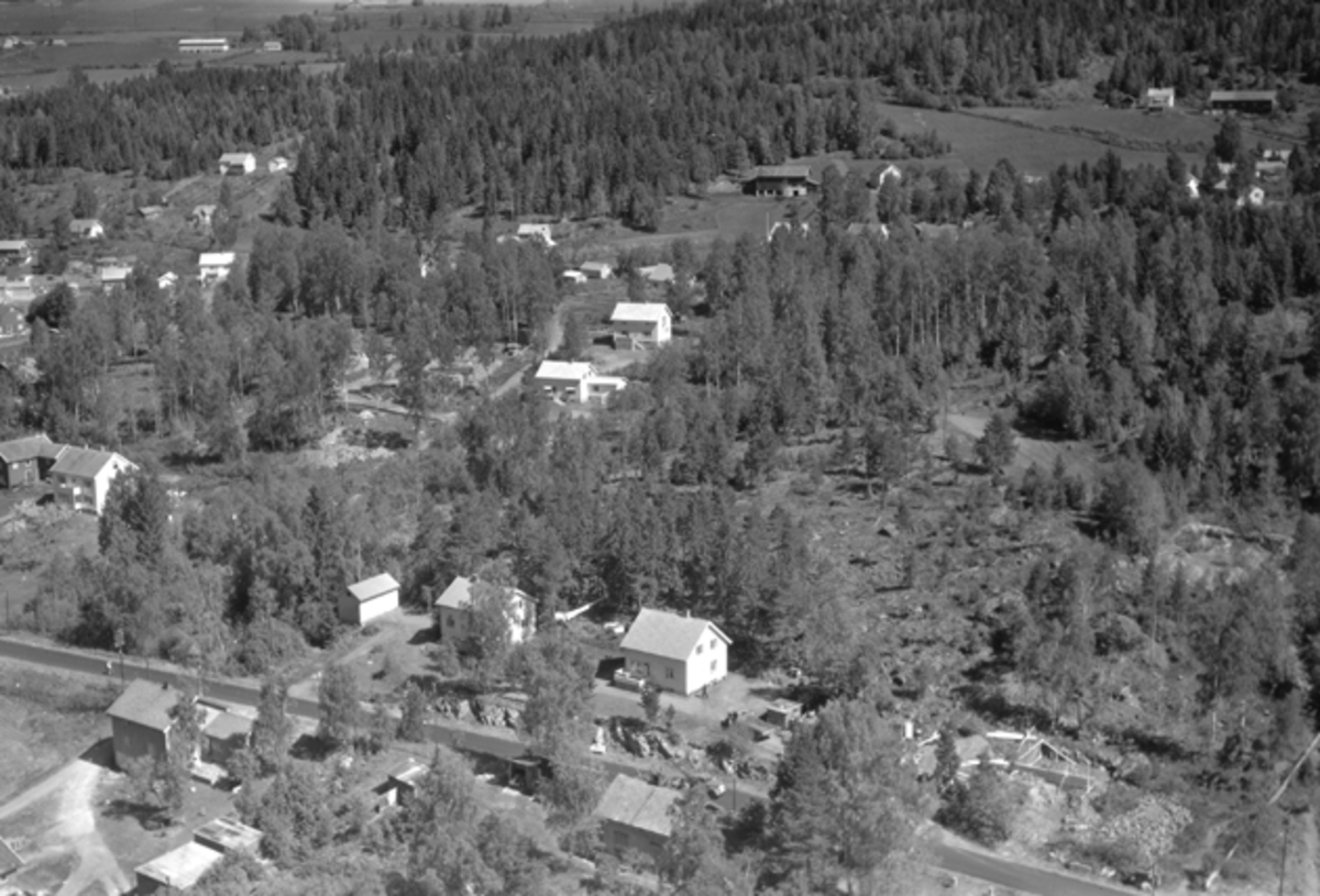 Widerøes Flyveselskap A/S, Flyfoto av Storgata, Haugertoppen, Moelv, Ringsaker.
