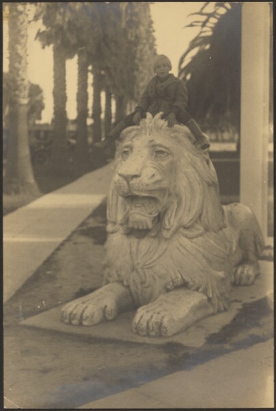 Louis Fleckenstein, [Child on Lion Statue]