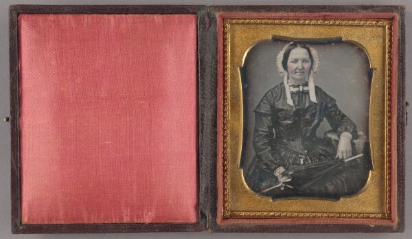 Unknown, [Portrait of a Seated Woman in Matron Cap Holding Umbrella]