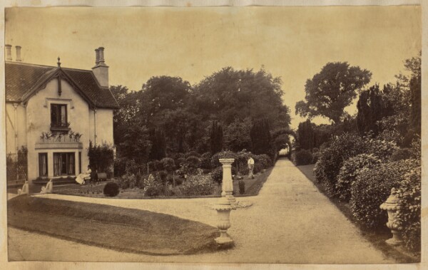 Unknown, [Grounds of a large house]