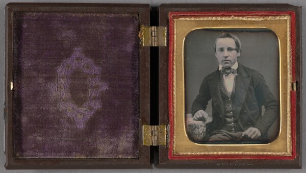 Unknown, [Portrait of a young man wearing a bow tie, seated]