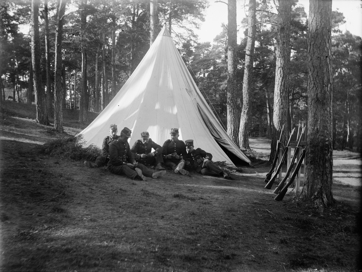 St Joseph, Militaries in front of tents in the forest