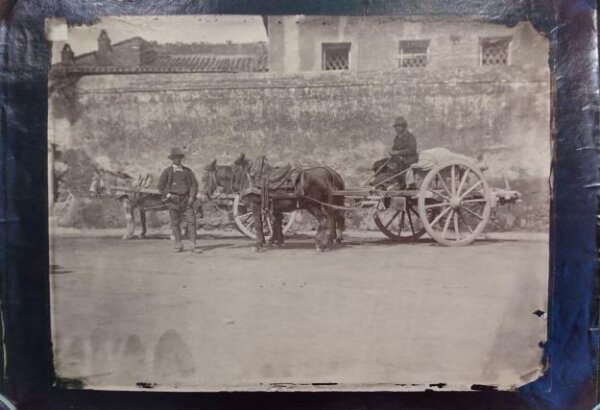 Unknown, Rural scene of two men, one donkey, two horses and two pulling carts, Italy