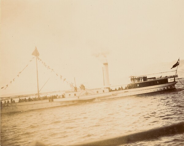Unknown, [Crowded river barge]