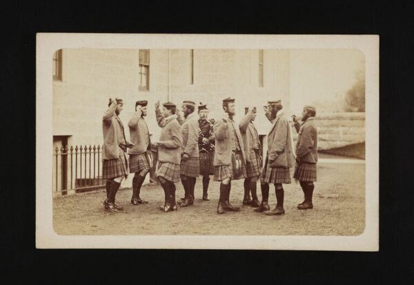 W. & D. Downey, A group of nine men dancing