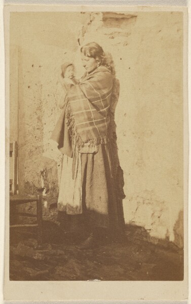 Unknown, [Unidentified woman wearing a shawl, holding a baby]