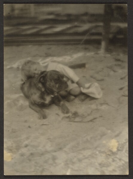Louis Fleckenstein, [Boy Lying on Dog]