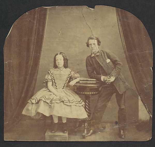 Unknown, [Young Girl, Seated, with Young Boy, Leaning on Table]