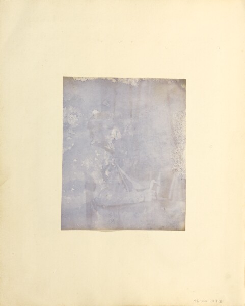 Unknown, [Profile portrait of a Seated Man Holding a Book]