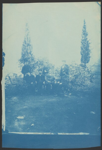 Carleton Watkins, [Group portrait at camp]