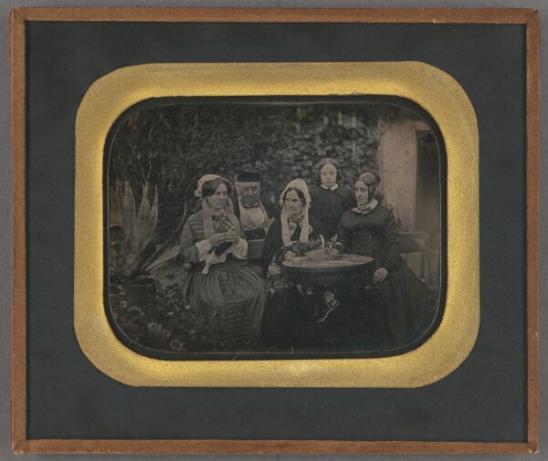 Unknown, [Group portrait of five people in a garden]