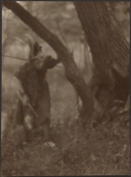 Louis Fleckenstein, [Woman in Head Dress Behind Tree]