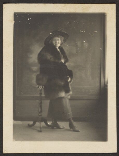 Louis Fleckenstein, [Woman Leaning Against Table]