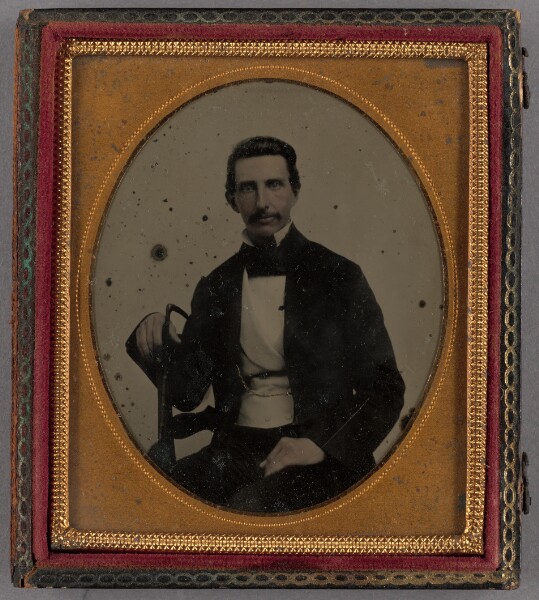 Unknown, [Portrait of a Seated Man with Moustache Holding a Walking Stick]