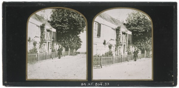 Unknown, [Unidentified British man wearing a top hat standing outside a two-storey house, an unidentified woman standing on the second floor balustrade]