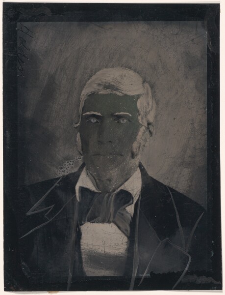 Unknown, [Portrait of man with large bow tie]