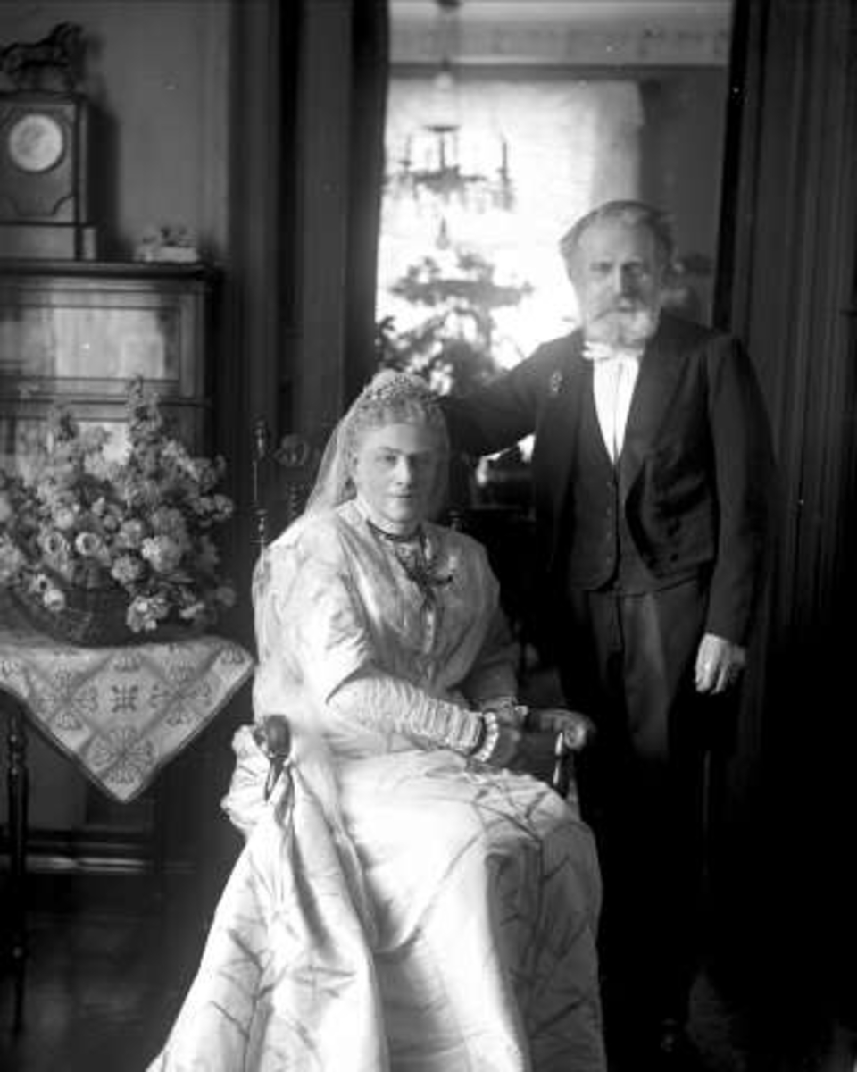 Gustav Borgen, Gruppeportrett, eldre ektepar. Herr og fru C. W. Berg (?)