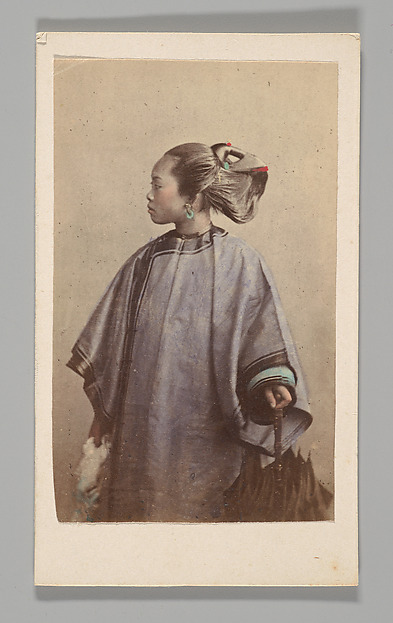 Unknown, [Studio Portrait: Woman Standing in Profile Holding Umbrella, Hong Kong]