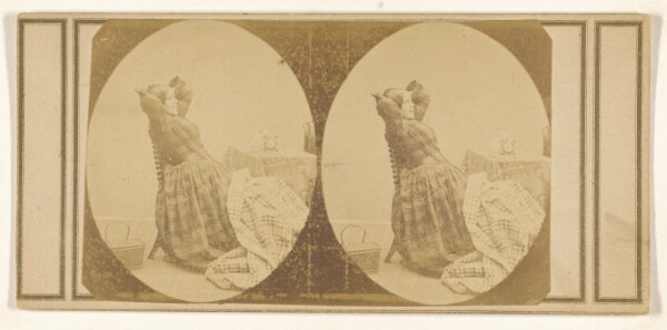 Unknown, [Woman seated with hands behind her head, material being sewn on her lap]