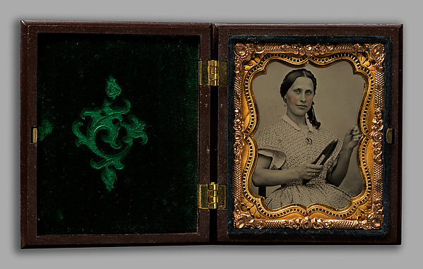 Unknown, [Woman Holding Shuttle]