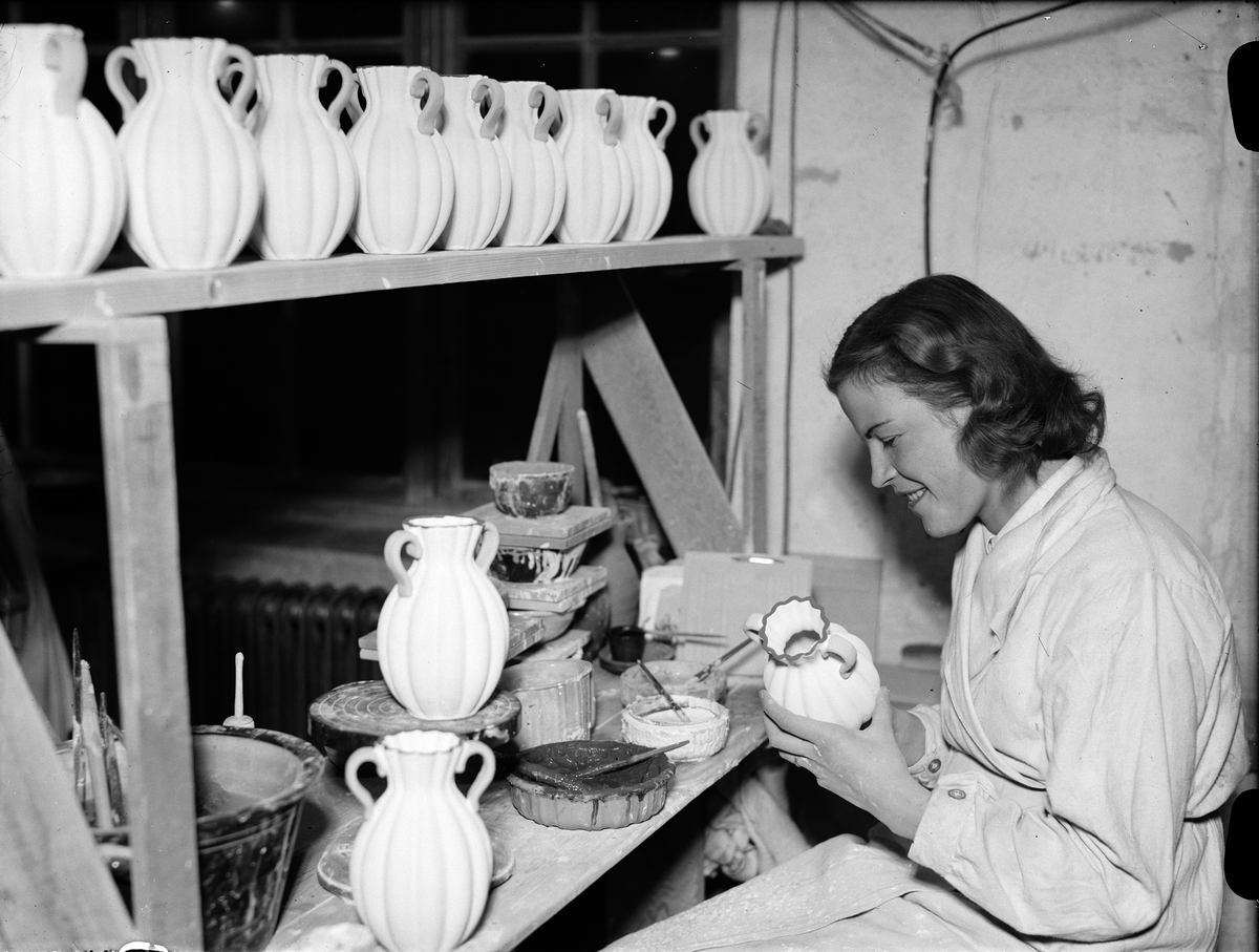 Paul Sandberg, “One of the many young ladies involved in ceramic decoration” at Upsala-Ekeby AB, Flogsta