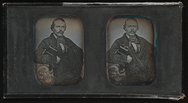 Unknown, [Stereoscopic Portrait of Man Holding Stereoscopic Viewer]