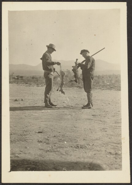 Louis Fleckenstein, [Fleckenstein and Man with Guns and Dead Jackrabbits]