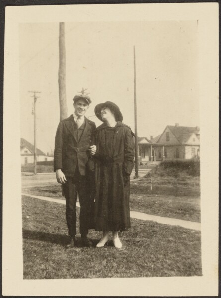 Louis Fleckenstein, [Man and Woman on Sidewalk]