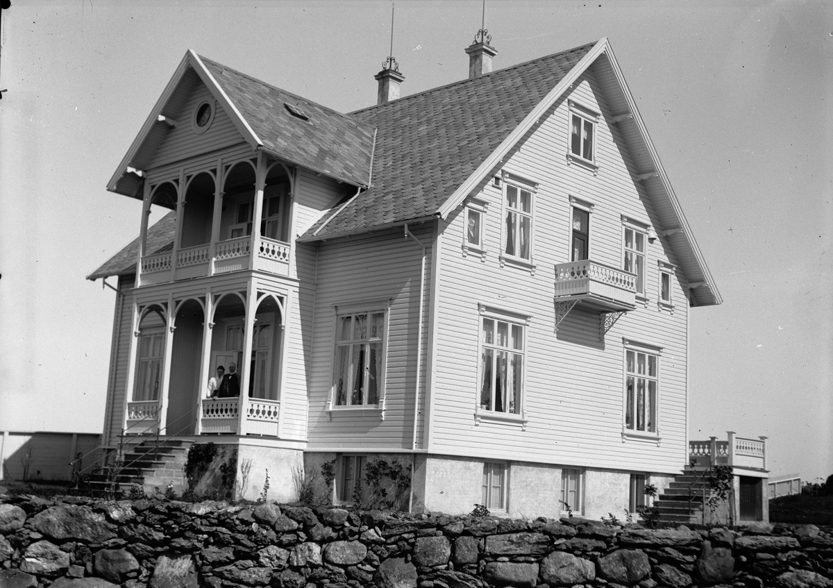 Okänd,, “Grönvold,” Christiane Liljefors parental home at Hornklovsgate in Stavanger, man and woman stand on the porch, Norway