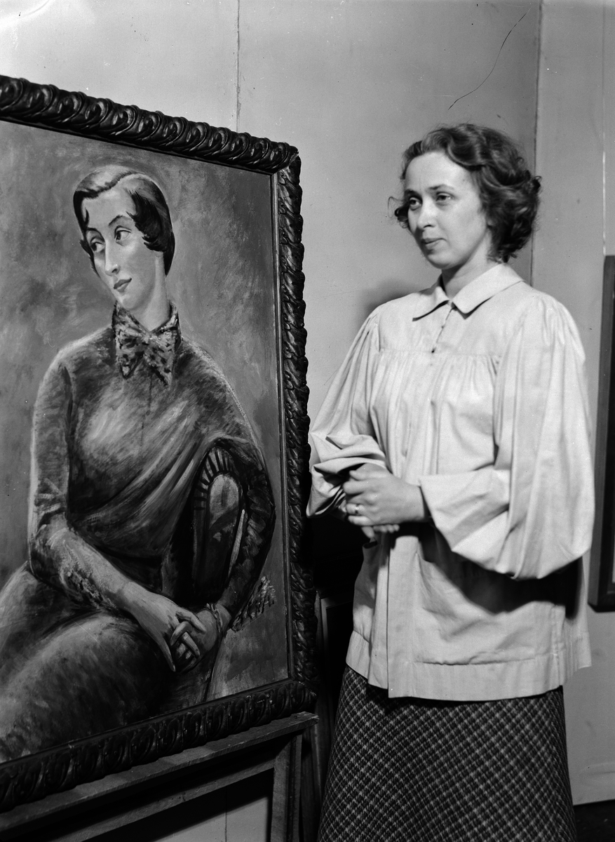 Paul Sandberg, Marking Grünewald at one of Isaac Grünewald’s paintings, art exhibition at Östgöta nation, Uppsala 1943