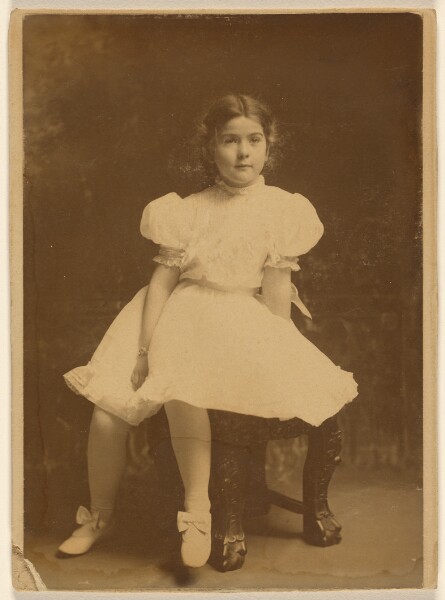 Unknown, [Unidentified young girl in a white dress, seated]