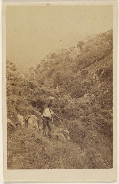 Unknown, [Unidentified man walking up a hill]