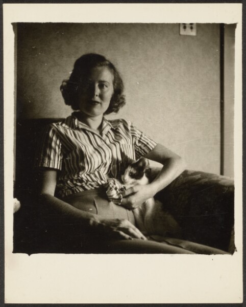 Louis Fleckenstein, [Woman in Chair with Cat]